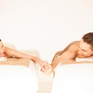 Picture,Of,Couple,In,Spa,Salon,Lying,On,The,Massage